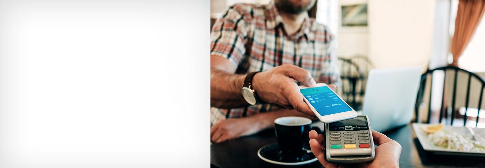 customer paying a merchant with a mobile device